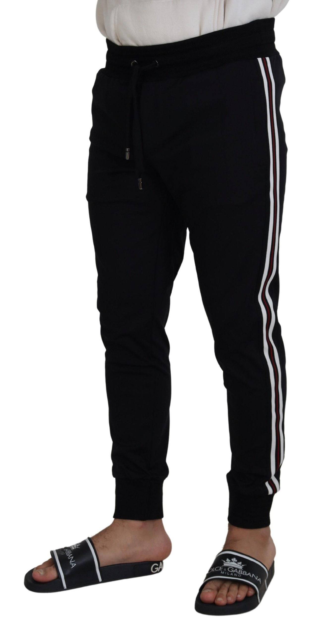 Pantalon jogger pour homme Dolce & Gabbana noir avec motif DG, tissu confortable et style décontracté.