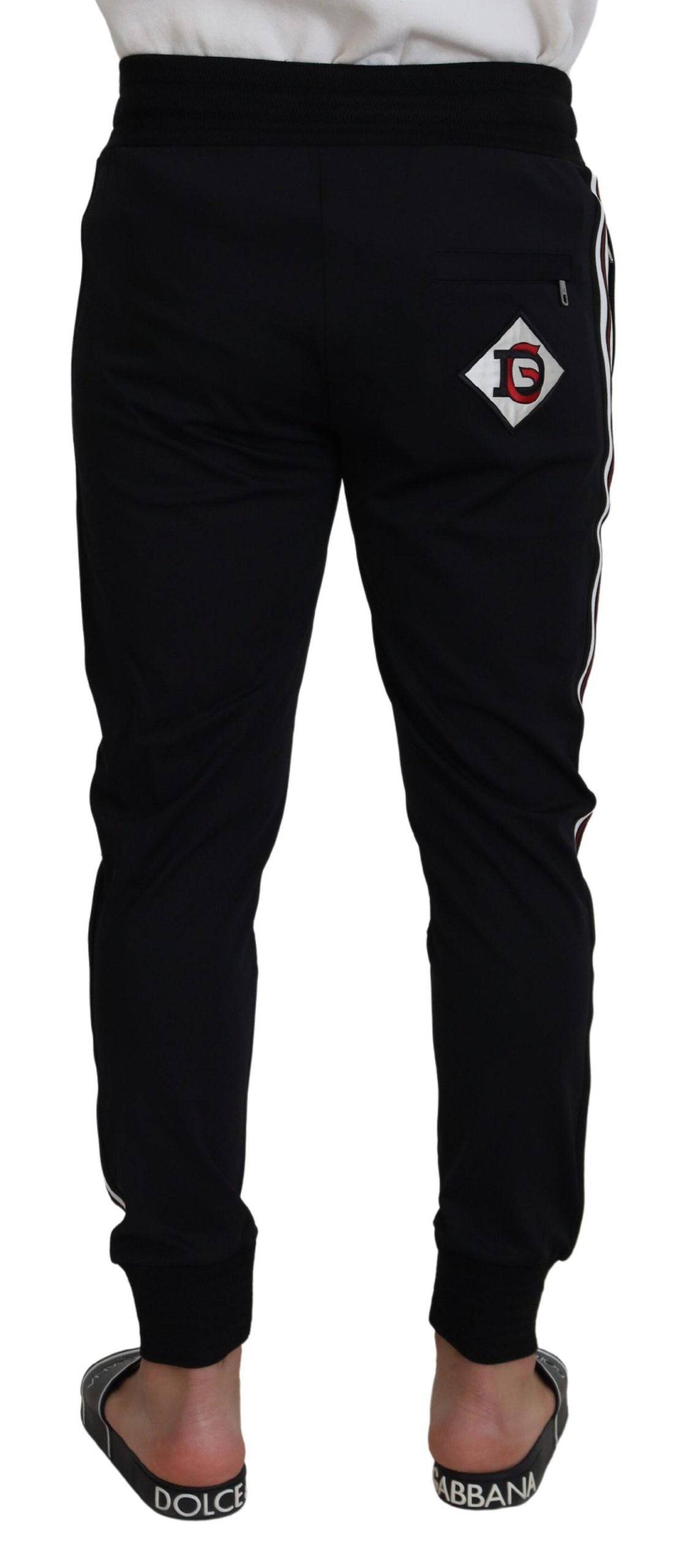 Pantalons joggers pour homme Dolce & Gabbana noirs avec motif DG, style décontracté et confortable, en tissu léger.