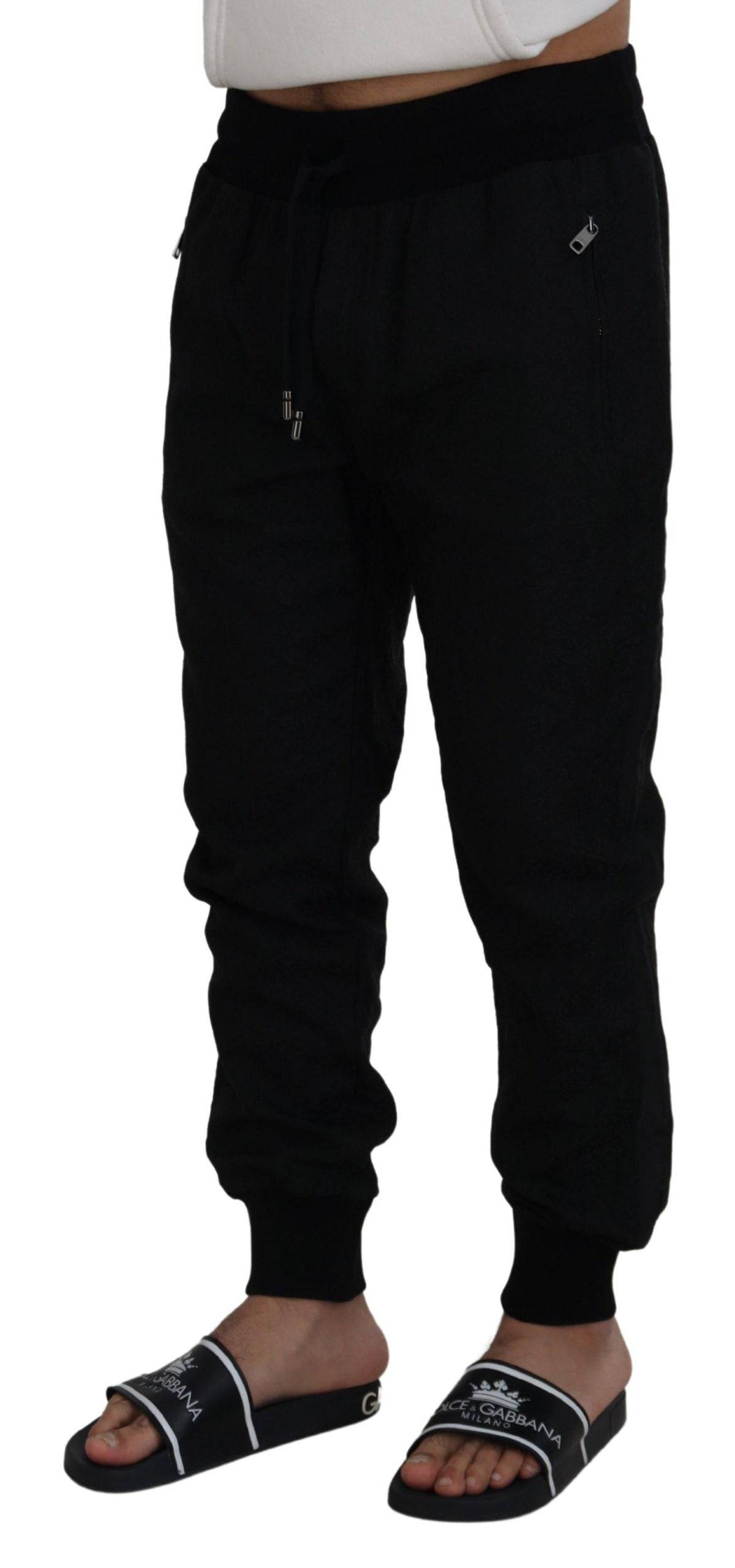 Pantalon jogger noir pour homme de style casual par Dolce & Gabbana, en tissu décontracté avec ceinture élastique.