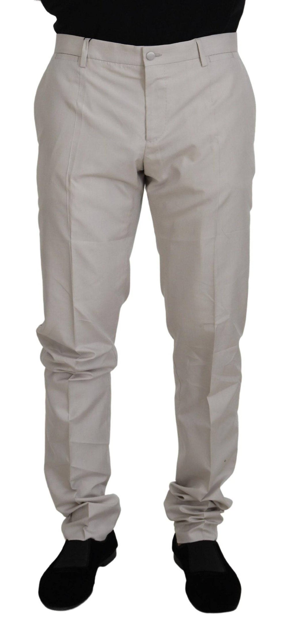 Pantalons chino en soie blanche à taille moyenne Dolce & Gabbana, style élégant et tissu léger visible sur l'image.