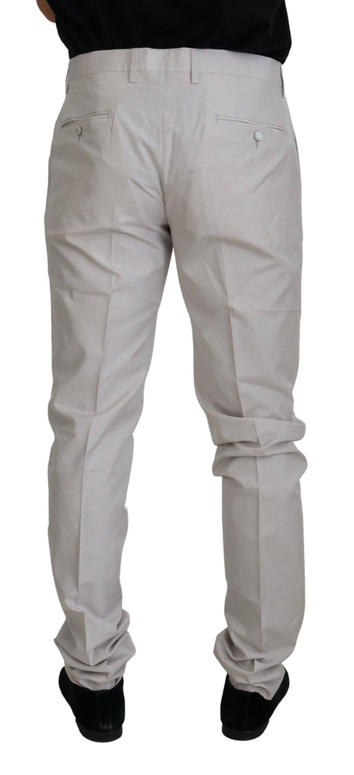 Pantalons chino en soie blanche Dolce & Gabbana à taille moyenne, élégants et confortables, avec une coupe moderne.