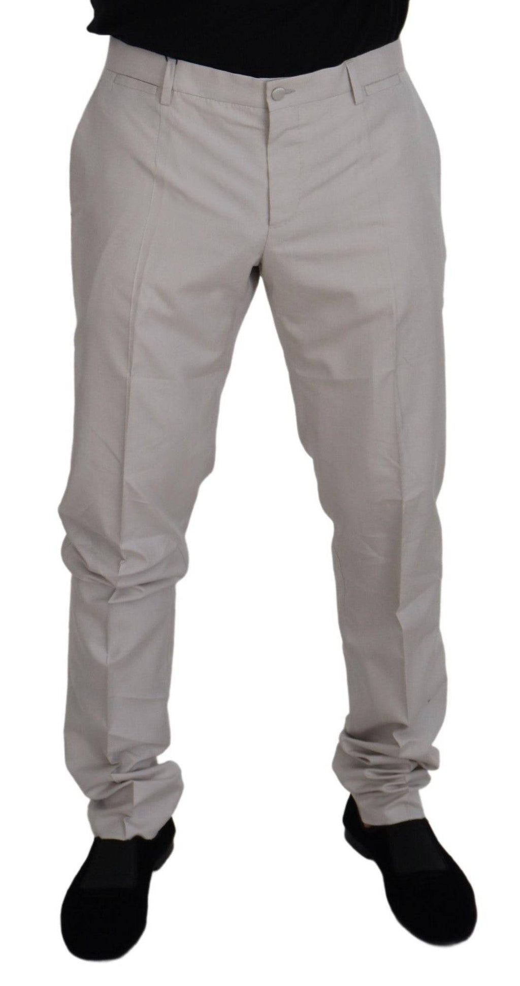 Pantalons chino en soie blanche à taille moyenne Dolce & Gabbana, élégants et confortables, visibles en image.