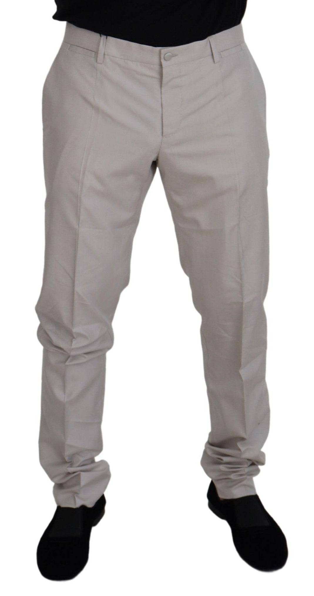 Pantalons chino en soie blanche à taille moyenne Dolce & Gabbana, élégants et confortables, visibles en image.