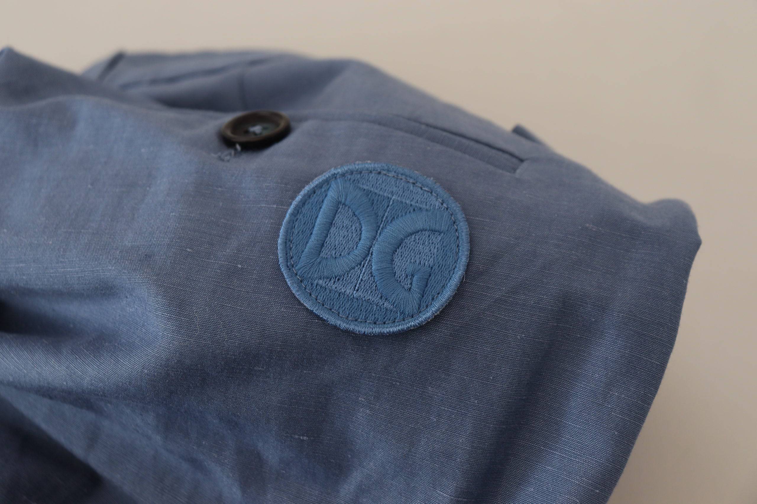 Pantalon chino en lin bleu pour homme de marque Dolce & Gabbana, style formel et élégant.