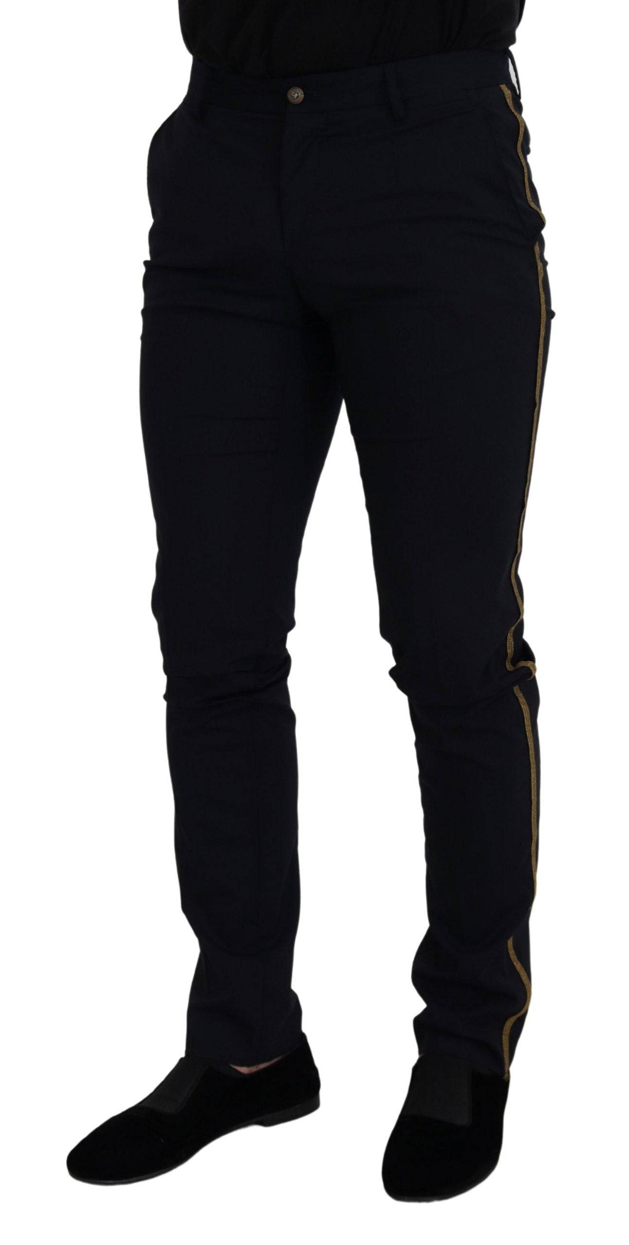 Pantalon formel noir en laine slim de Dolce & Gabbana, coupe élégante, parfait pour les occasions sophistiquées.