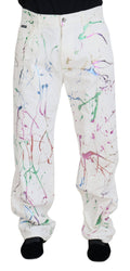 Pantalons en denim blanc Dolce & Gabbana avec impression colorée, coton et coupe classique visible sur l'image.