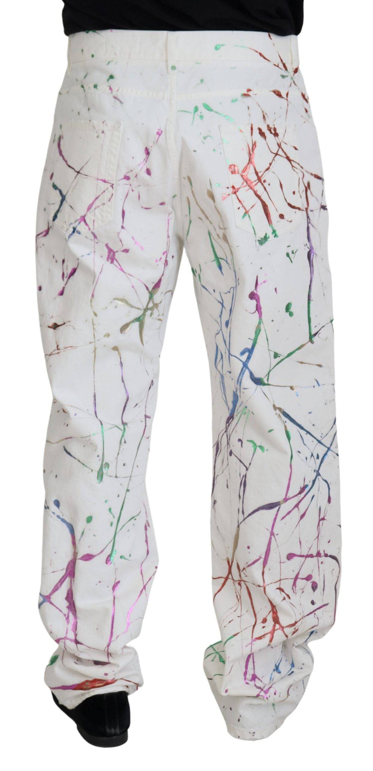 Pantalon en denim blanc Dolce & Gabbana avec impression colorée, coton, style décontracté, visible en gros plan.