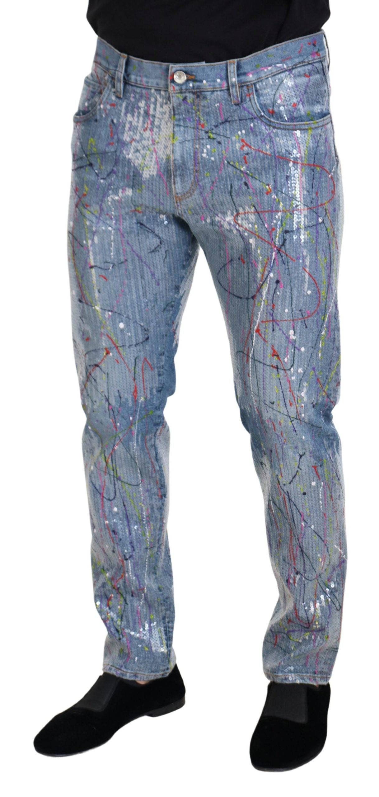 Jeans en denim bleu Dolce & Gabbana avec motif coloré à éclaboussures de peinture, en coton, style décontracté.