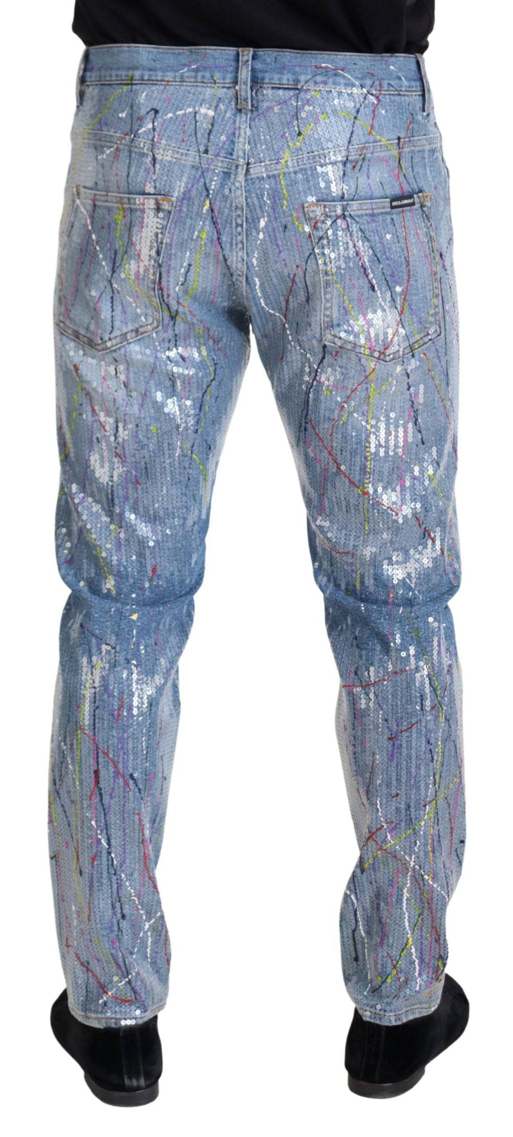 Jean en denim bleu Dolce & Gabbana avec imprimé éclaboussures de couleur en coton, mode élégante et décontractée.