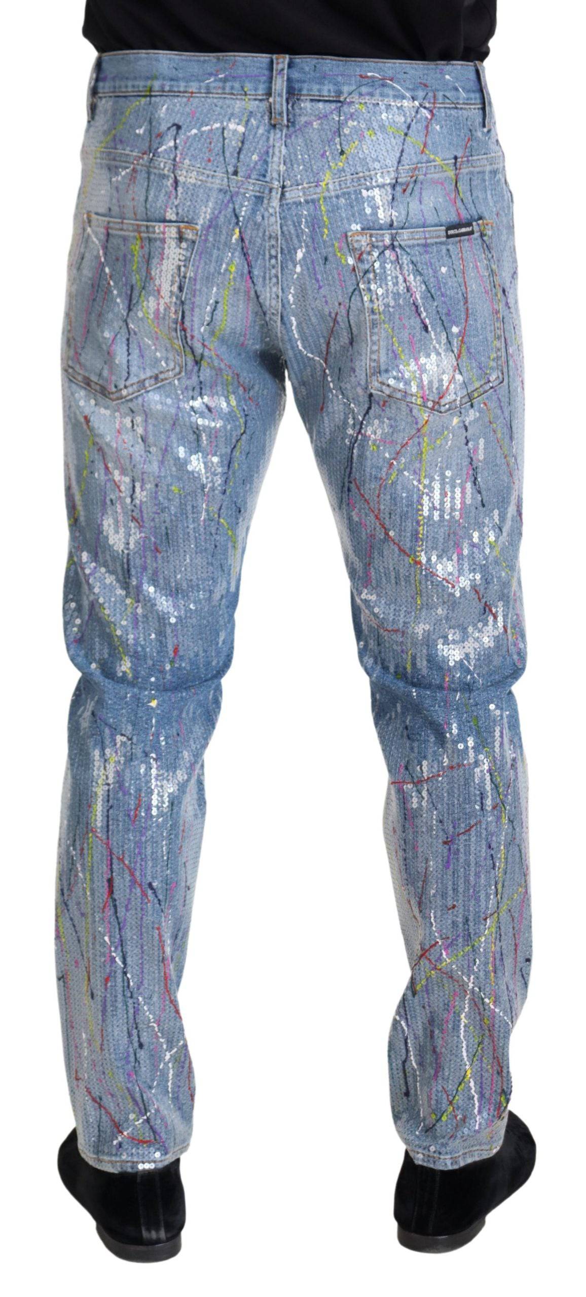 Jean en denim bleu Dolce & Gabbana avec imprimé éclaboussures de couleur en coton, mode élégante et décontractée.