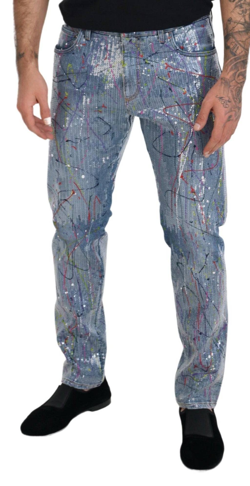 Jeans en denim Dolce & Gabbana avec éclaboussures de couleur bleue et coton, style décontracté et tendance.
