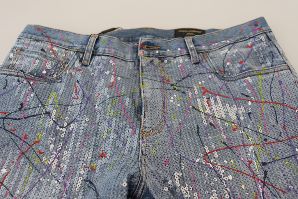 Jeans en denim bleu Dolce & Gabbana avec motif coloré en coton, style décontracté et imprimé artistique.