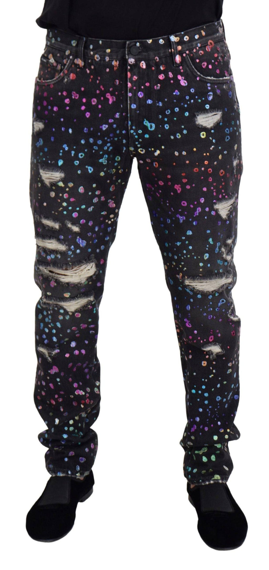 Jeans en denim déchiré noir à imprimé multicolore de Dolce & Gabbana, style tendance et détails déchirés visibles.