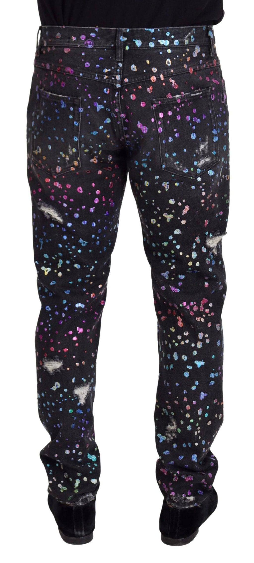 Jeans en jean déchirés Dolce & Gabbana noirs avec imprimé multicolore, style décontracté et tendance.