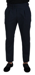 Pantalon formel homme Dolce & Gabbana à rayures bleues, coupe élégante et tissu de qualité visible sur l'image.