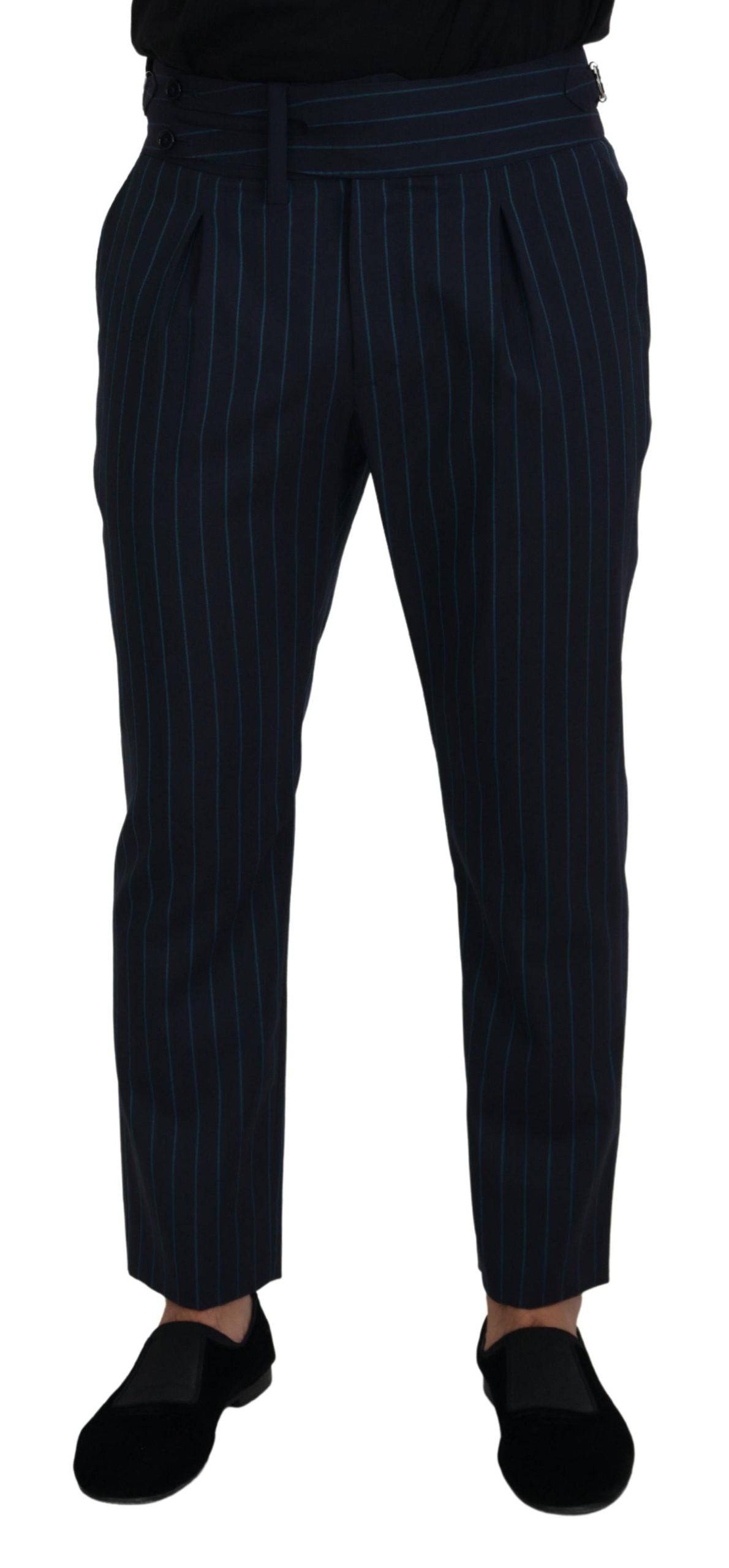 Pantalon formel homme Dolce & Gabbana à rayures bleues, coupe élégante et tissu de qualité visible sur l'image.