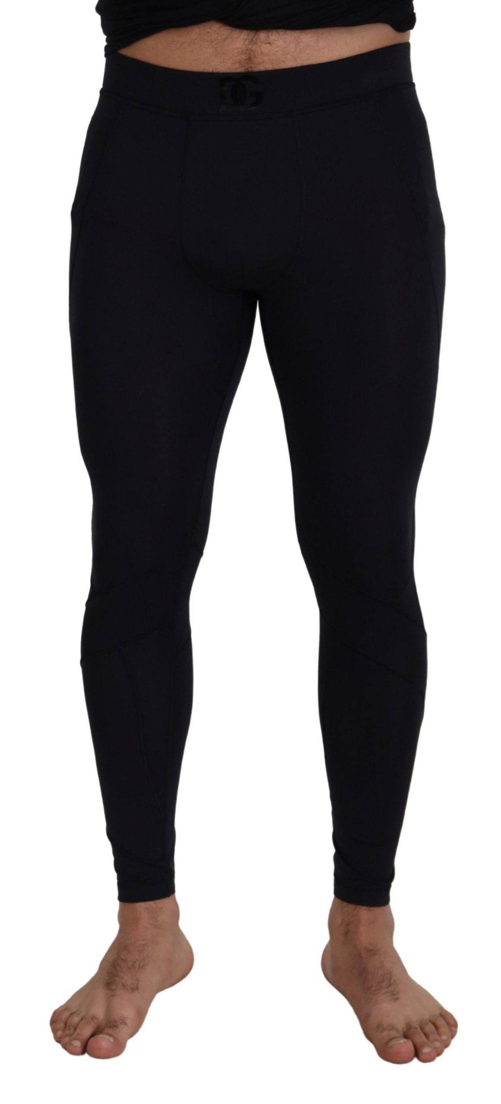 Pantalon noir en nylon extensible Dolce & Gabbana, coupe slim, pour homme, visible en détail dans l'image.