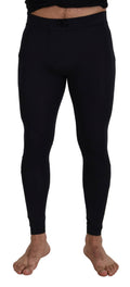 Pantalon noir en nylon extensible Dolce & Gabbana, coupe slim, pour homme, visible en détail dans l'image.