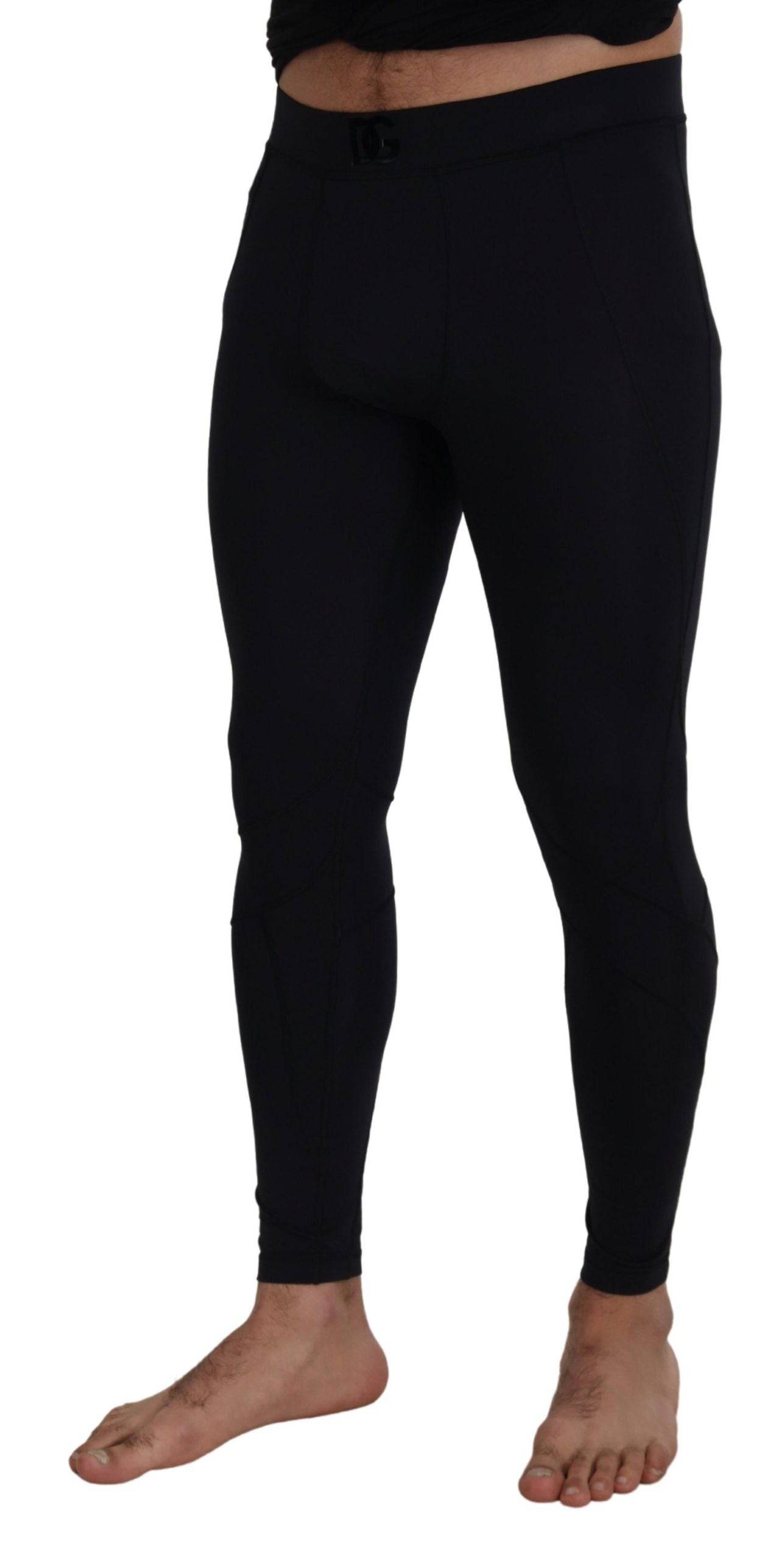Pantalon noir en nylon extensible Dolce & Gabbana, coupe slim, pour homme, détails modernes et ajustement élégant.
