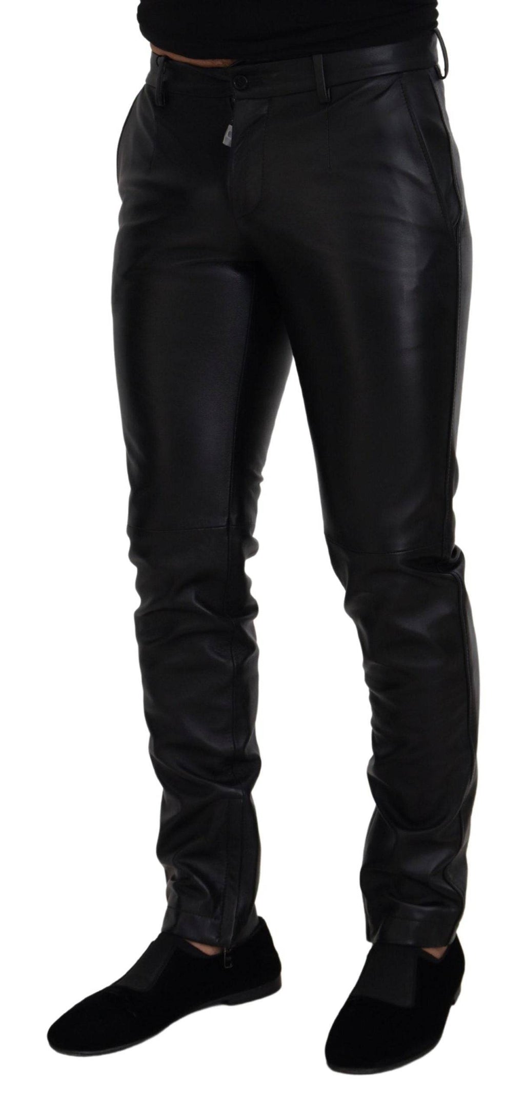 Pantalon skinny noir brillant en stretch de Dolce & Gabbana, coupe ajustée et élégante, en tissu extensible.