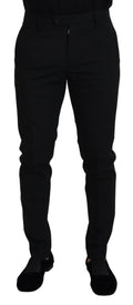 Pantalons formels en polyester noir Dolce & Gabbana, style chino, vue de face avec détails élégants.
