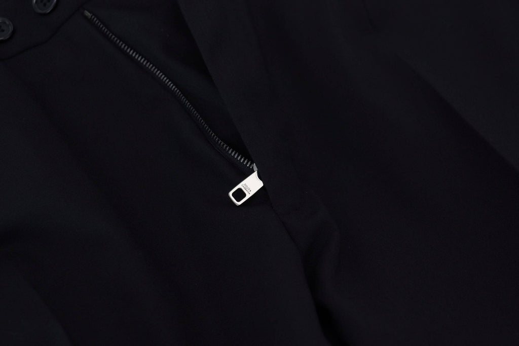 Pantalon formel noir en polyester Dolce & Gabbana, coupe chino élégant pour hommes, visible sur l'image.