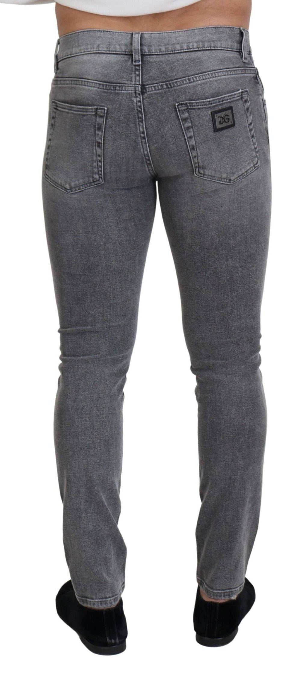 Jeans skinny en denim gris délavé Dolce & Gabbana en coton, vue de face avec détails de couture et coupe ajustée.