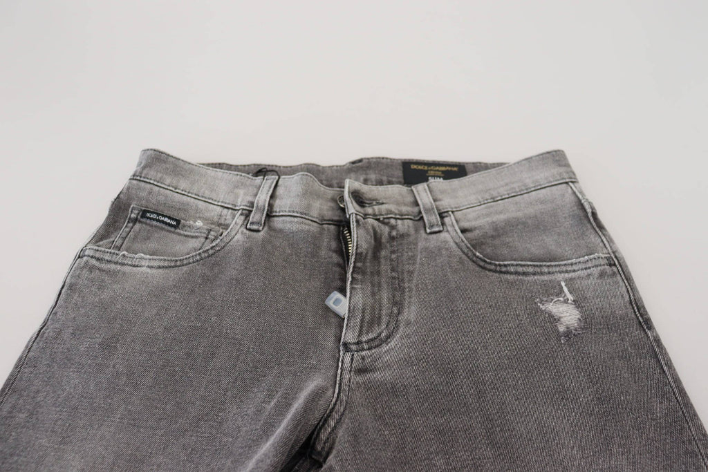 Jeans skinny en denim gris lavé de Dolce & Gabbana, tissu en coton, ajustement moulant et détails élégants.