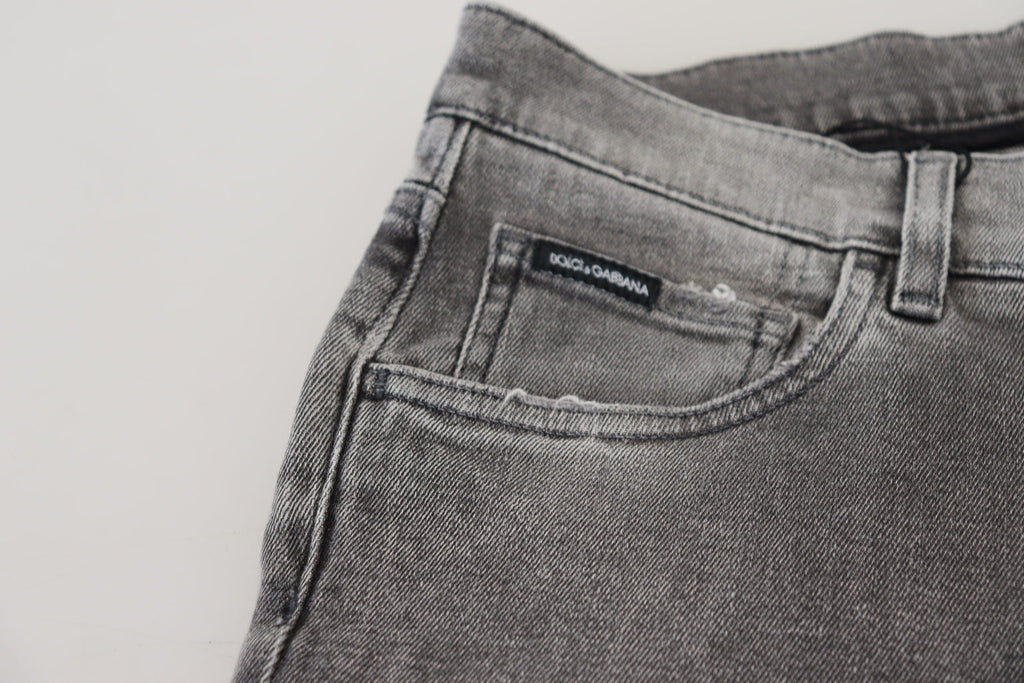 Jeans skinny en denim gris délavé de Dolce & Gabbana avec coupe ajustée et détails classiques.