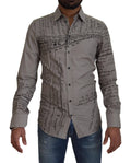 Robe slim en coton gris imprimé de Dolce & Gabbana avec détails dorés, style élégant et moderne.