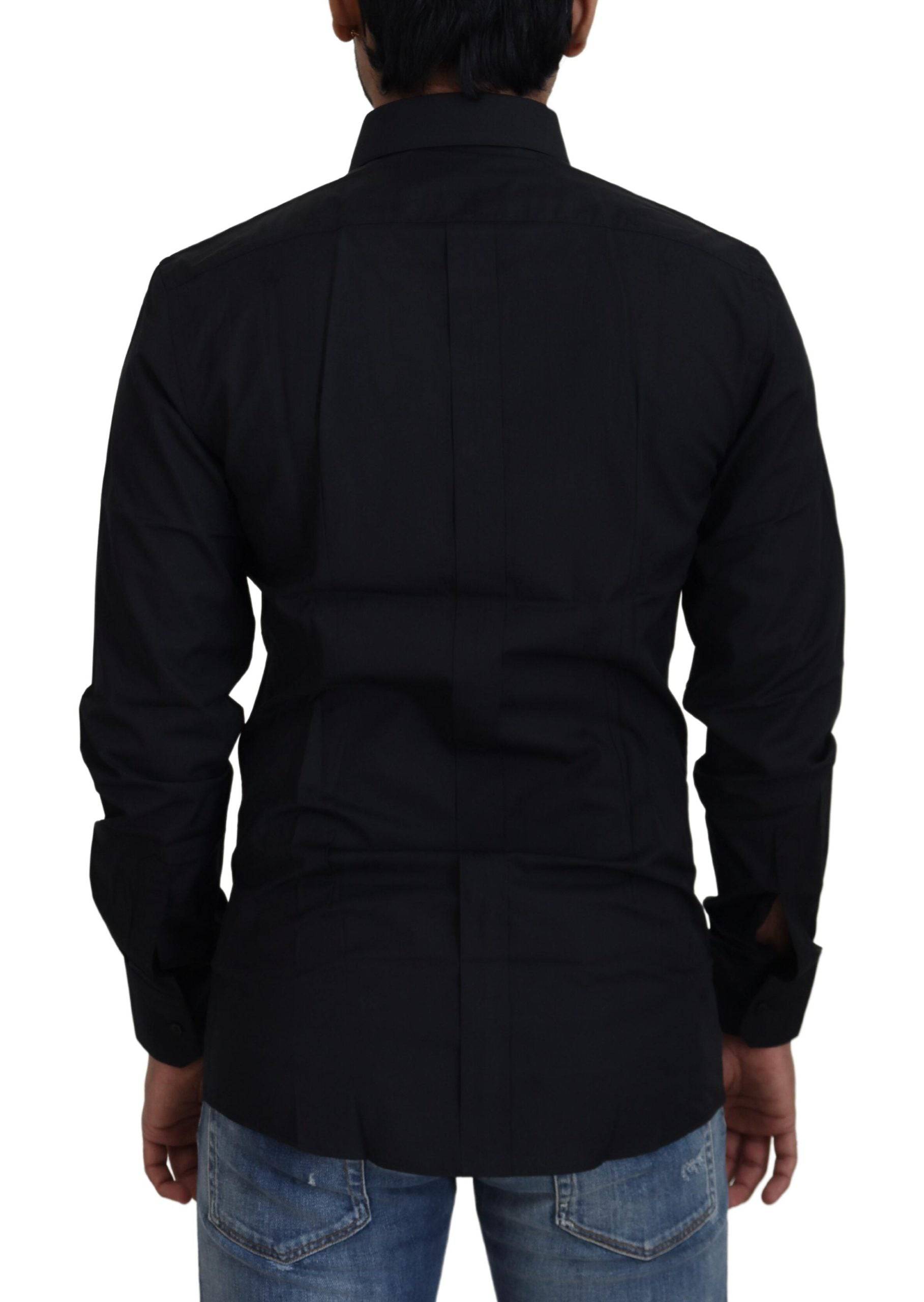 Chemise formelle noire en coton Dolce & Gabbana, coupe slim fit, avec détails dorés visible sur l'image.
