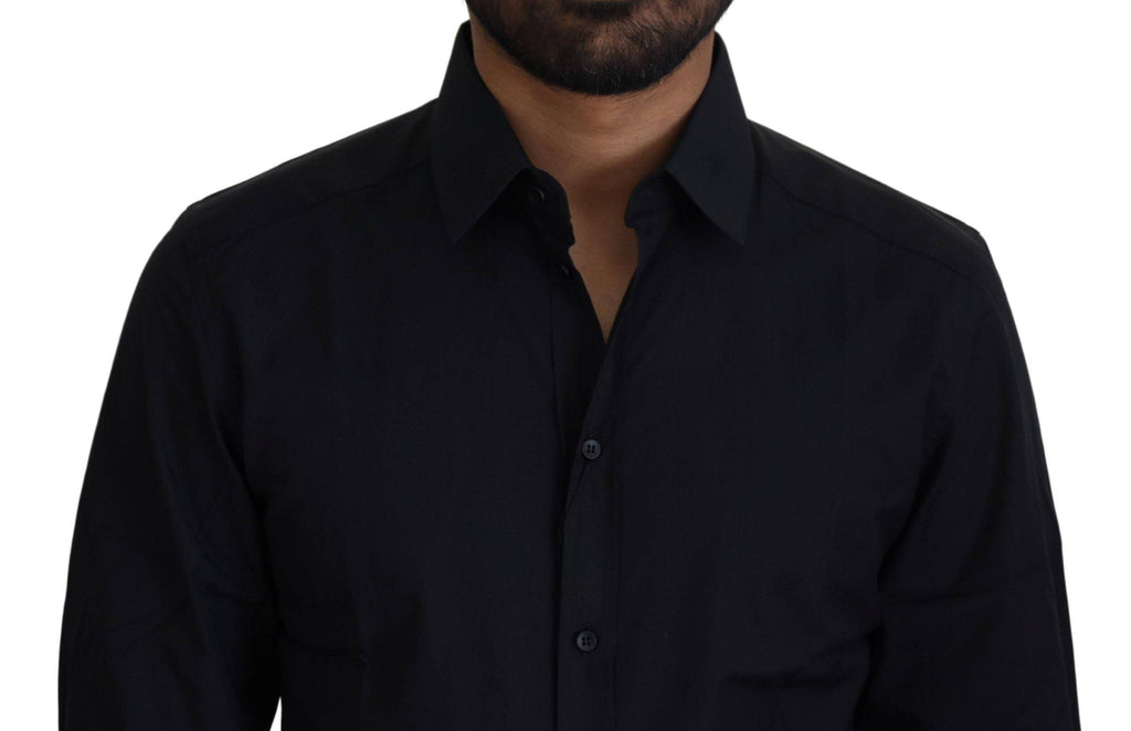 Chemise formelle noire en coton Dolce & Gabbana avec coupe slim et détails dorés, vue de face.