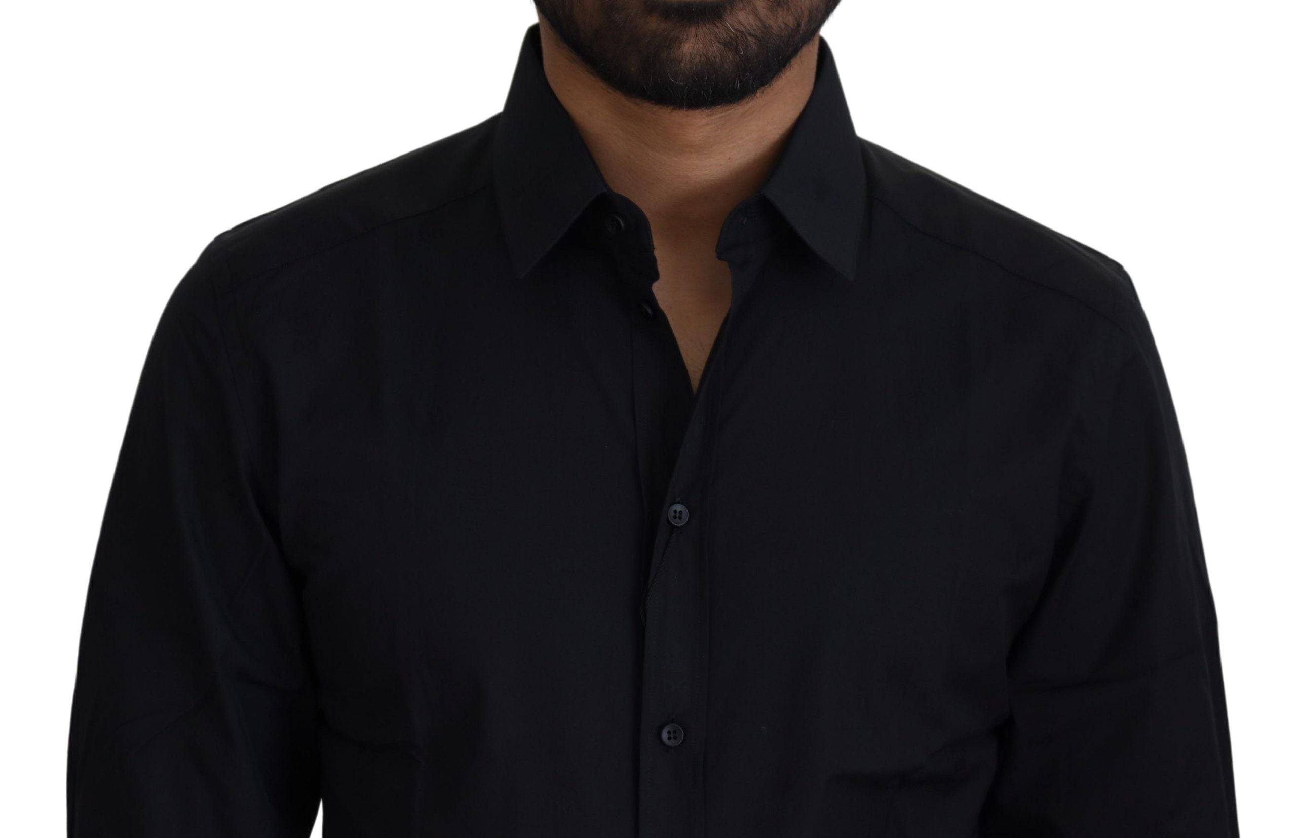 Chemise formelle noire en coton Dolce & Gabbana avec coupe slim et détails dorés, vue de face.