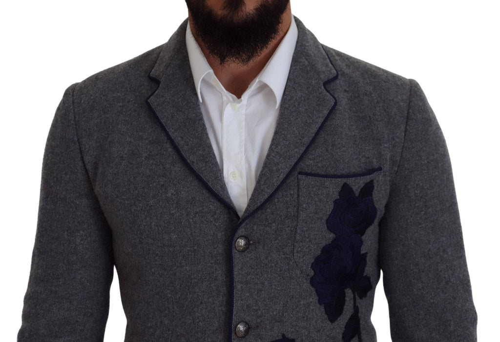 Veste blazer slim fit en laine grise avec motifs de roses pour homme, de la marque Dolce & Gabbana, vue de face.
