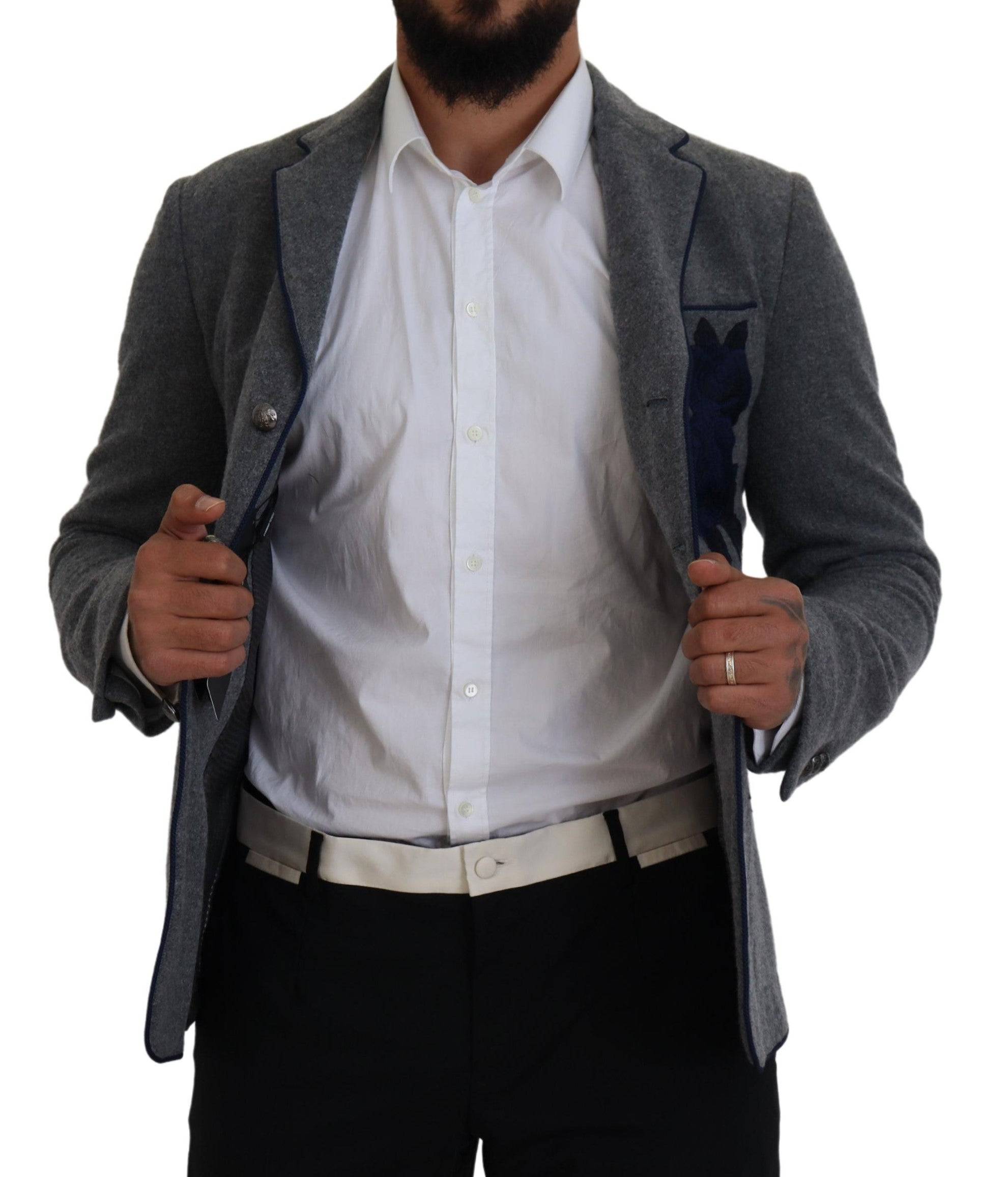 Veste blazer en laine gris Dolce & Gabbana avec motifs de roses, coupe slim fit, élégante et raffinée.