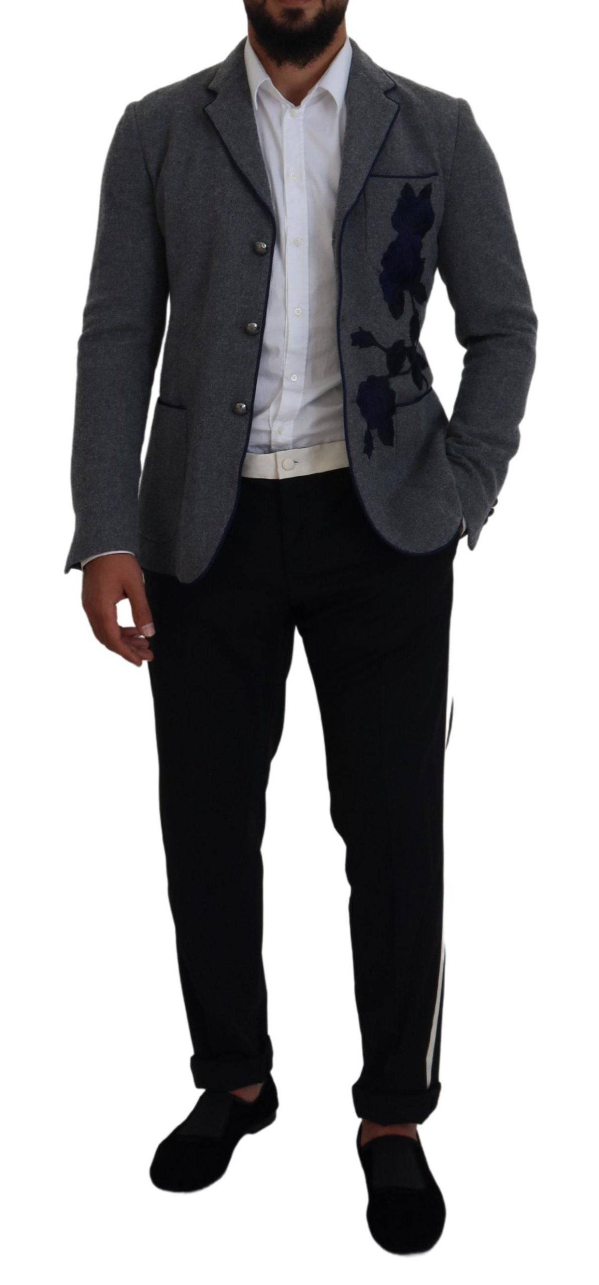 Veste blazer gris en laine avec motifs roses, coupe slim fit, par Dolce & Gabbana, détail de la texture et du design.