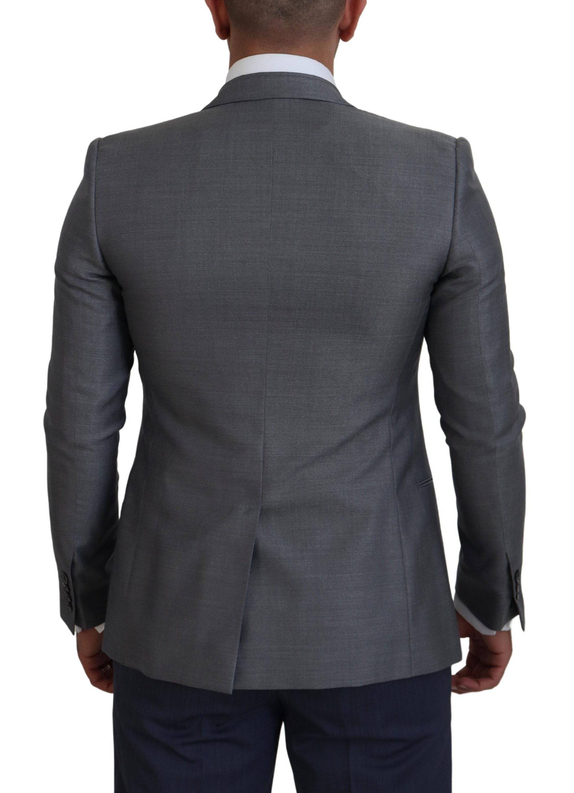 Veste blazer en laine et soie gris clair de Dolce & Gabbana, coupe slim fit, élégante et sophistiquée.