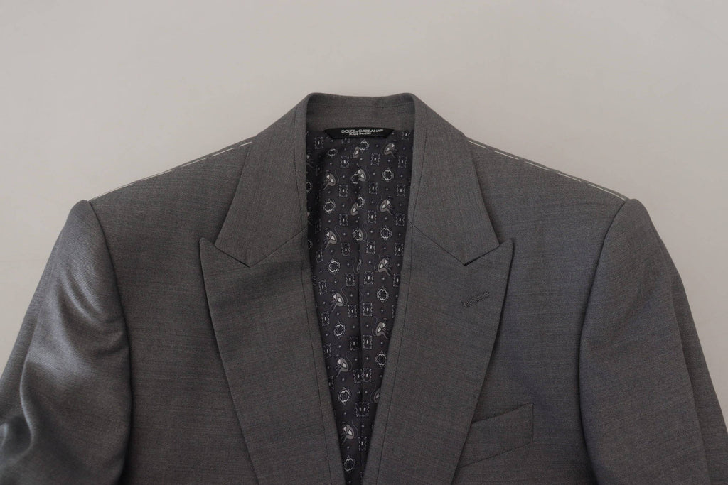 Veste blazer slim fit en laine et soie gris Dolce & Gabbana, élégante et ajustée, visible sur un mannequin.