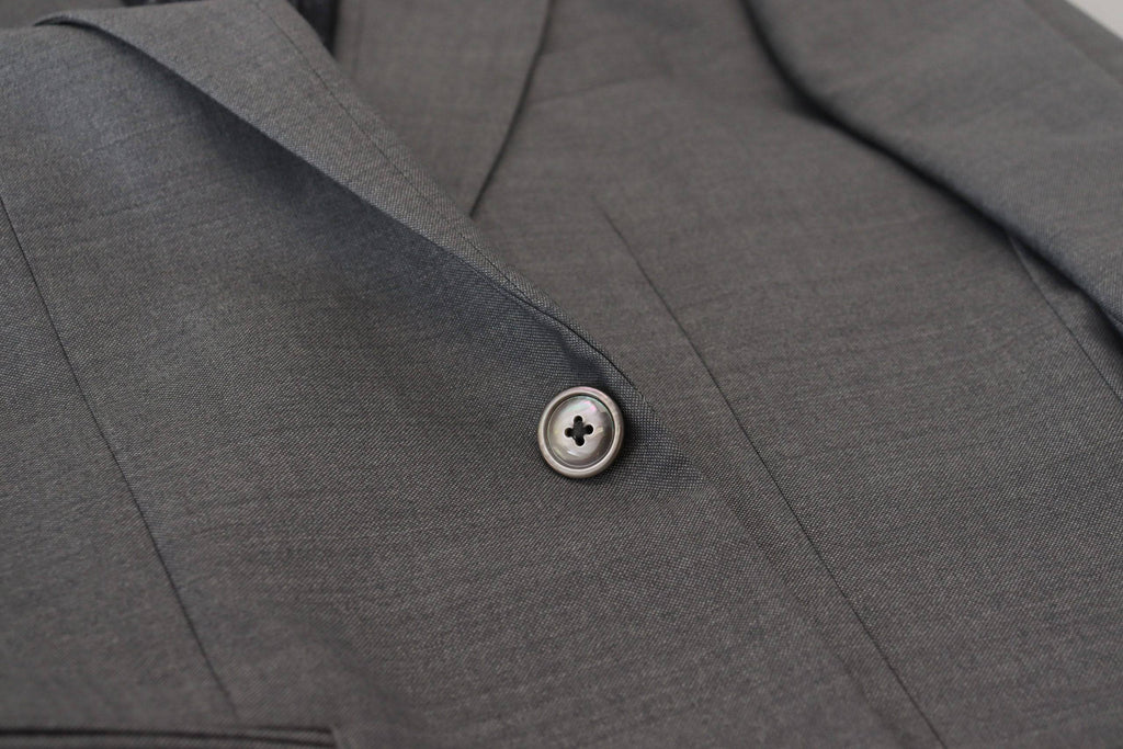 Veste blazer en laine et soie gris clair de Dolce & Gabbana, coupe slim fit, élégante et sophistiquée, vue en gros plan.