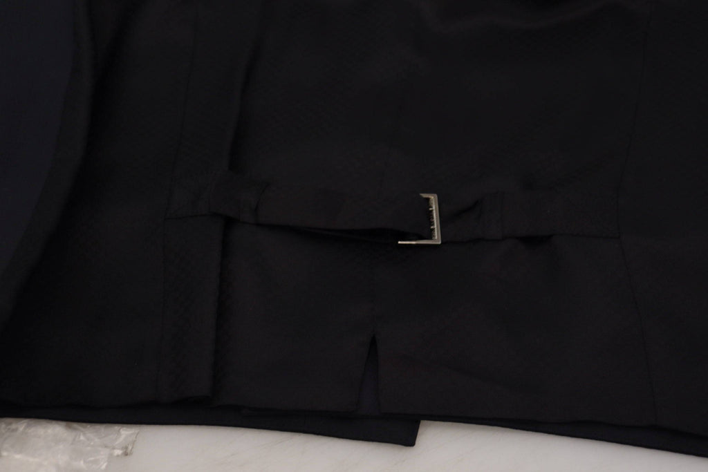 Gilet formel en laine stretch noir Dolce & Gabbana avec taille ajustée, idéal pour une tenue élégante et sophistiquée.