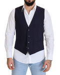 Gilet formel en laine bleu foncé de Dolce & Gabbana avec taille extensible, détail élégant et coupe ajustée.