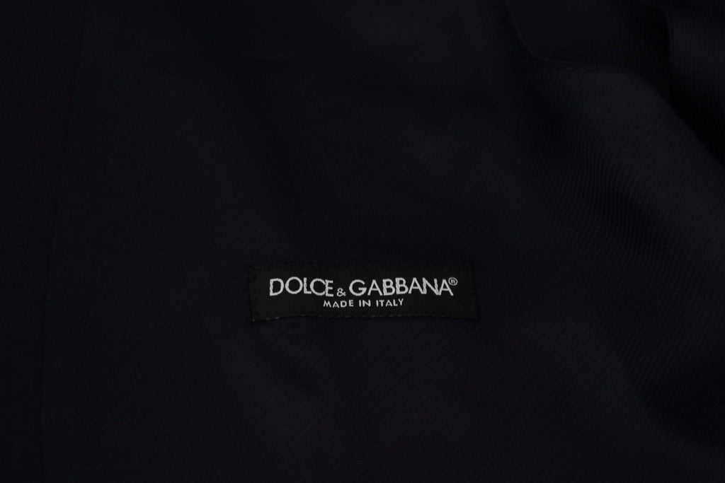 Gilet formel en laine bleu foncé de Dolce & Gabbana, coupe stretch, avec fermeture à boutons et col classique.