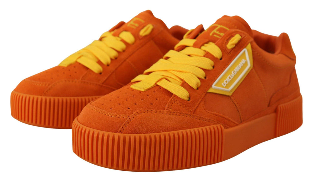 Chaussures sneakers Dolce & Gabbana P.j. Tucker en cuir orange avec design moderne, vue de face.