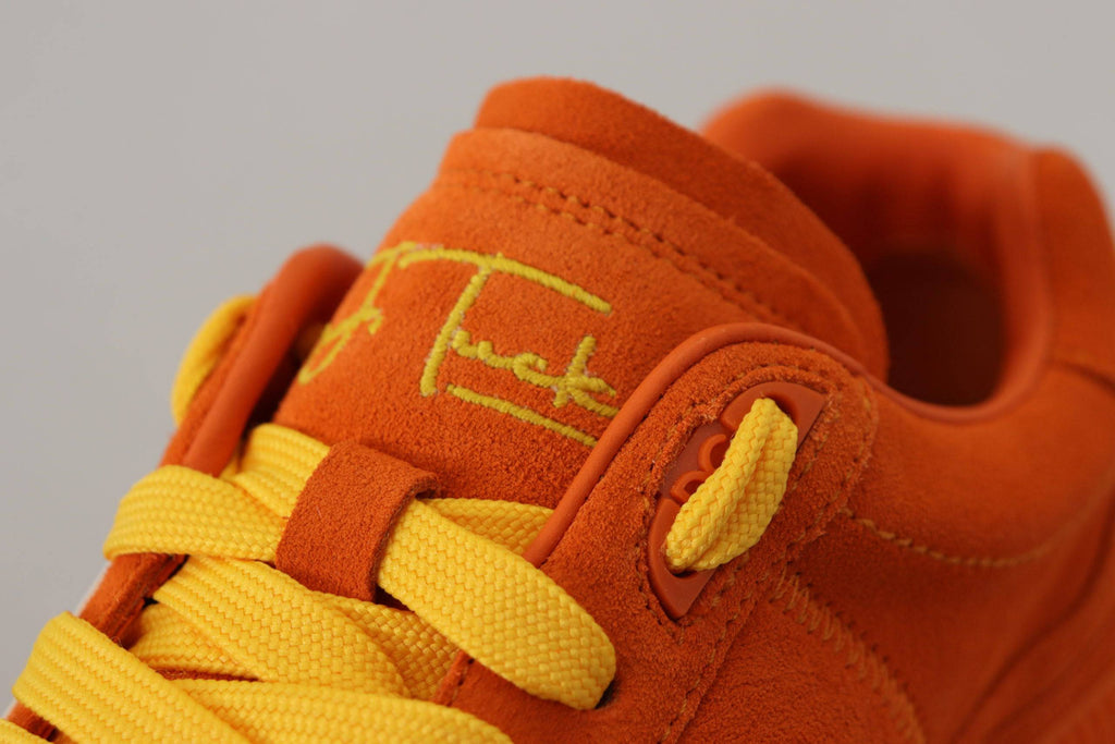 Chaussures sneakers Dolce & Gabbana P.J. Tucker en cuir orange, style sportif avec design moderne et détails élégants.