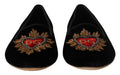 Chaussures plates Dolce & Gabbana DG Sacred Heart noire avec patch, slip-on élégantes et confortables pour femme.