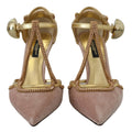 Chaussures Dolce & Gabbana à talons T-strap roses et cristaux roses, élégantes et sophistiquées pour femmes.