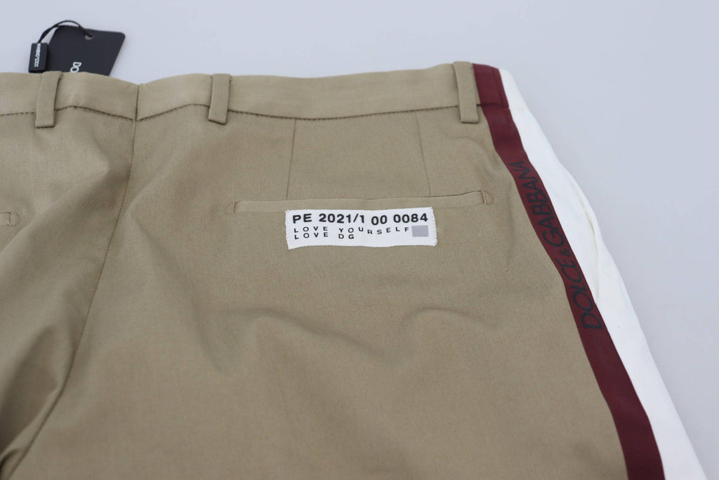 Pantalons chino Slim Fit blanc et marron Dolce & Gabbana pour homme, en tissu léger et ajusté, visible en gros plan.