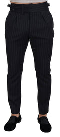 Pantalons chino en laine noire à rayures de Dolce & Gabbana, élégants et classiques, visibles en gros plan.