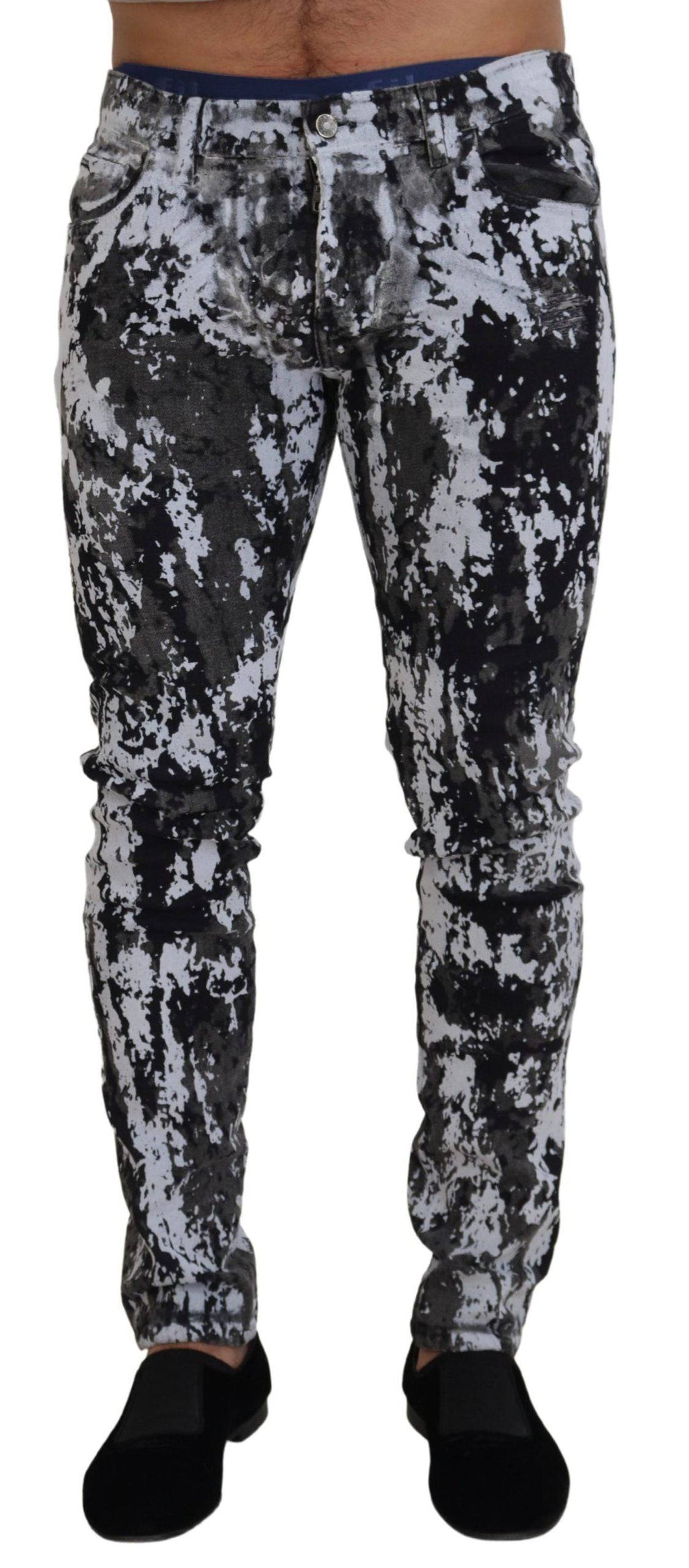Jeans skinny en denim à motif tie-dye multicolore de Dolce & Gabbana, en coton, avec coupe ajustée et détails colorés.