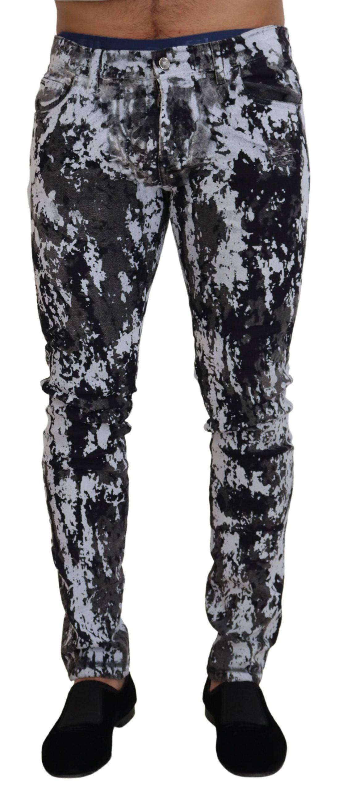 Jeans skinny en denim à motif tie-dye multicolore de Dolce & Gabbana, en coton, avec coupe ajustée et détails colorés.